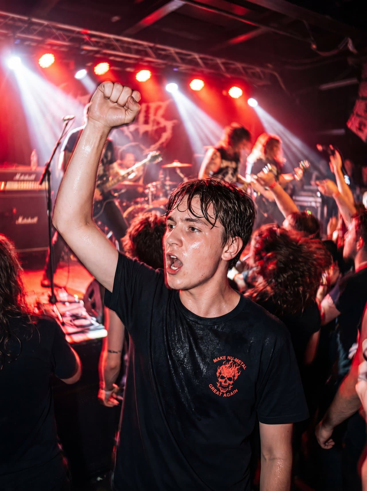 Front row at a show in the MAKE NU-METAL GREAT AGAIN tee